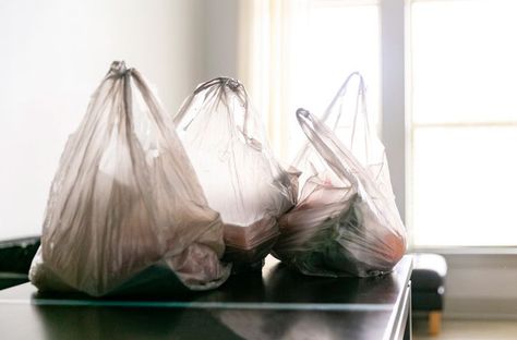 5 Ways to Store Plastic Grocery Bags for Easy Reuse Store Plastic Grocery Bags, Grocery Bag Storage, Storing Plastic Bags, Shopping Bag Storage, Plastic Bag Storage, Hacks And Tricks, Plastic Shopping Bags, Plastic Grocery Bags, Organizing Hacks