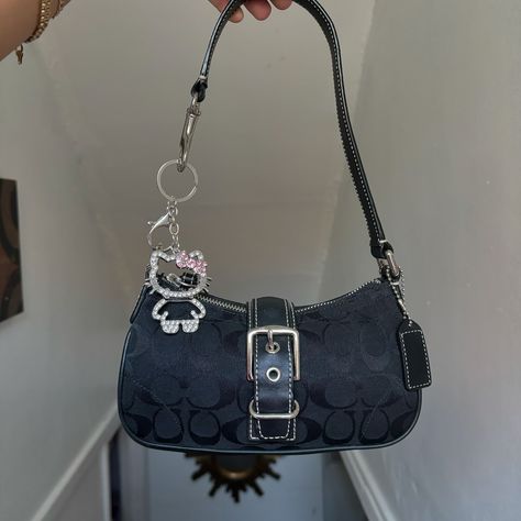 $220 free shipping 💌SOLD Y2K Coach Demi Black Buckle Hampton Shoulder Bag ⁩approx measurements 8.5” L 4.5” H 2” W with 7” drop - excellent condition🍒 charm included - very tiny and lightweight! super cute!! - magnetic buckle closure #coach #vintage #y2k #minimalistic #purse Coach Demi Bag Outfit, Coach Bags With Charms, Coach Bag Charms, Tiny Purses, Buckle Bags, Vintage Coach Bags, Vintage Shoulder Bag, Black Shoulder Bag, Christmas 2023