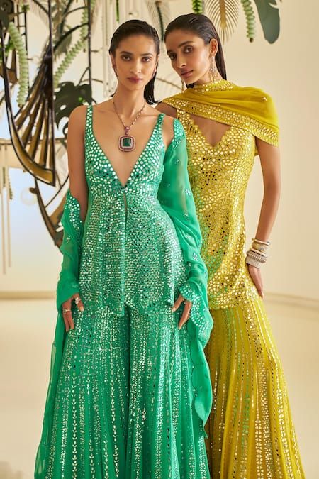 Buy Green Georgette Embroidered Embellished Peplum Kurta Sharara Set For Women by Seema Gujral Online at Aza Fashions. Indian Simple Wedding Outfits, Mirror Work Yellow Lehenga, Mirror Work Outfits, Mirror Work Sharara Suit, Mirror Work Sharara, Mirror Work Fabric, Gharara Designs, Yellow Mirror, Georgette Sharara