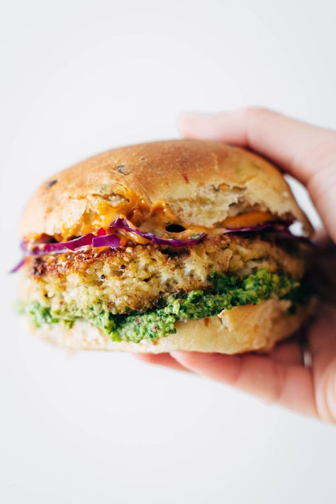 Spicy Cauliflower Burgers with avocado sauce, cilantro lime slaw, and chipotle mayo! Burgers With Avocado, Cauliflower Burger, Lime Slaw, Cilantro Lime Slaw, Spicy Cauliflower, Chipotle Mayo, Avocado Sauce, Vegan Burgers, Veggie Burgers