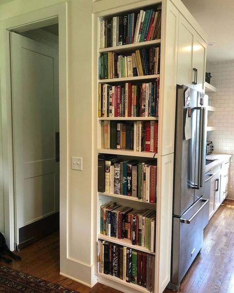 This version is a bit more sneaky, incorporating the bookshelves on the side of the fridge and not necessarily in the kitchen area. Image credit: INSTAGRAM @KRISTIKRAUSSHOME Side Of Fridge, Victoria Kitchen, Cookbook Kitchen, Above Fridge, Cookbook Storage, Kitchen Bookshelf, Floor To Ceiling Bookshelves, Kitchen Book, Small Kitchen Design