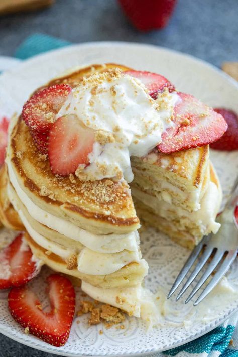 Pancakes for breakfast or dessert! These fluffy Cheesecake Pancakes are topped with a cream cheese frosting for a fun and delicious treat. Stuffed Cheesecake Pancakes, Cream Cheese Stuffed Pancakes, Cream Cheese Topping For Pancakes, Cheesecake Pancakes Recipe, Cheesecake Pancakes, Fluffy Cheesecake, Cream Cheese Pancakes, Pancakes For Breakfast, Pancake Toppings