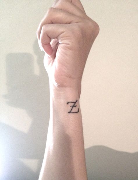 Initial Z calligraphy monogram tattoo letter Initial Z Tattoo, Z Initial Tattoo, Z Tattoo Letter, Z Tattoo Letter Design, Letter Z Tattoo, Queer Tattoos, Small Letter Tattoo, Calligraphy Monogram, Tattoos Cross