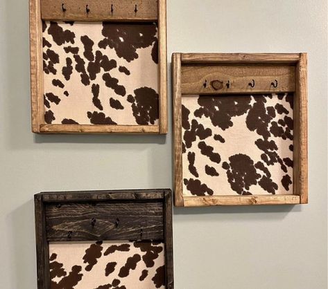 Cowhide Jewelry Holder, Wood Western Decor, Country Western Craft Ideas, Cowhide Projects Ideas, Western Hanging Decor, Western Boho Diy Decor, Cow Print Wall Decor, Western Dollar Tree Diy, Western Craft Fair Display