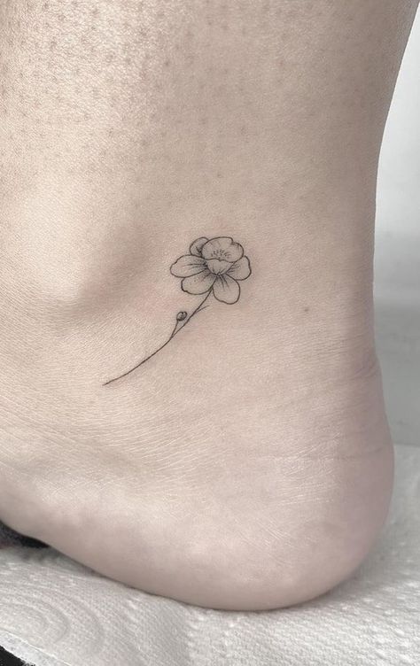 Small Daffodil Tattoo Behind Ear, Daffodil And Ladybug Tattoo, Micro Daffodil Tattoo, Daffodil With Butterfly Tattoo, Jonquils Tattoo, Tiny Daffodil Tattoo Simple, Daffodil Tattoo Wrist, Daffodil Tattoo Birth Flower, Minimalist Narcissus Tattoo