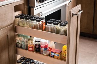 Yorktowne Cabinets | Food and Pantry Spice Rack Cabinet Pull Out, Yorktowne Cabinets, Kitchen Spice Storage, Spice Rack Organization, Pull Out Spice Rack, Cabinet Spice Rack, Kitchen Spice Racks, Spice Drawer, Cabinet Remodel