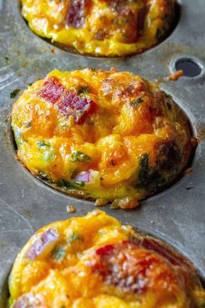 Keto Bacon Egg Muffins are low in carbs and high in protein and packed with tons of bacon, cheese and sausage.  The perfect muffin tin eggs, these Keto Bacon Egg Muffins are fun to make, super tasty and the best easy low-carb keto breakfast on the go. | A Wicked Whisk #breakfastmuffins #breakfasteggmuffins #eggmuffincups #healthyeggmuffins #lowcarbeggmuffins #ketobreakfast #ketoeggmuffins #lowcarbbreakfast #lowcarbeggcups #ketoeggmuffinsbacon #ketoeggmuffinssausage Muffin Tin Eggs, Keto Breakfast On The Go, Low Carb Egg Muffins, Bacon Egg Muffins, Breakfast Egg Muffins, Keto Bacon, Keto Muffins, Egg Muffins Breakfast, Keto Recipes Breakfast