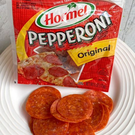 How to Make Pepperoni Roses | Chica and Jo Pepperoni Rosettes, Pepperoni For Charcuterie, Pepperoni Roses Easy Recipes, How To Roll Pepperoni For Charcuterie, Charcuterie Board Pepperoni Rose, Small Pepperoni Rose, Pepperoni Rose How To, Pepperoni On Charcuterie Board, How To Fold Pepperoni For Charcuterie Board