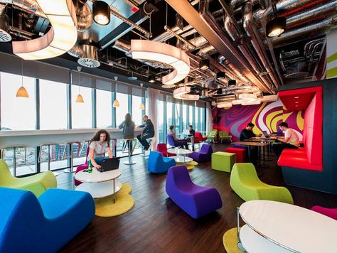 The colorful Dublin offices have plenty of space for employees to relax and work. Google Headquarters, Work Communication, Google Office, Work Lounge, Business Lounge, Touch Down, Office Space Design, Street Marketing, Creative Office