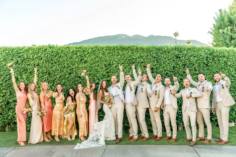 Colorful Bridal Party in the beautiful Omni Rancho Las Palmas Pink And Yellow Groomsmen, Colorful Bridesmaids And Groomsmen, Colorful Wedding Bridal Party, Sunset Wedding Groomsmen, Multi Colored Bridal Party, Pastel Bridal Party Groomsmen, Garden Party Groomsmen, Garden Party Wedding Groomsmen, Colorful Wedding Groomsmen