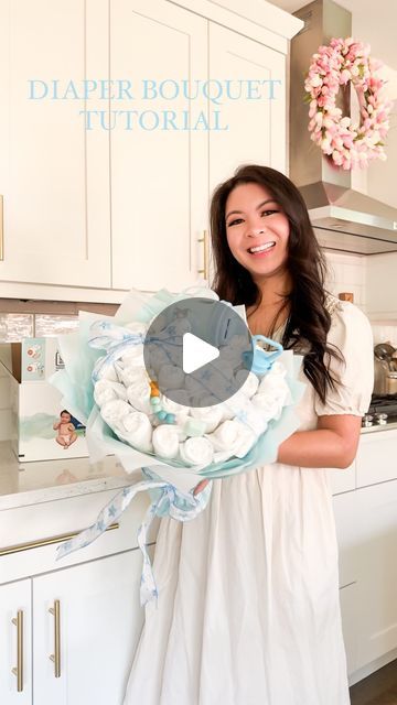 Tina | Seattle Blogger on Instagram: "DIAPER BOUQUET TUTORIAL 👶🏻💐 Had so much fun making this diaper bouquet and I absolutely love how it turned out!!! It’s easier and less time consuming than a diaper cake too! Comment SHOP to get a list of supplies needed to recreate this or go to my Amazon page under Crafts! #diaperbouquet #babygift #diybouquet" How To Make A Nappy Cake, How To Make A Diaper Cake For Baby Boy, Teddy Bear Diaper Cake Tutorial, Diaper Tower Ideas, Diaper Flowers Bouquet, Baby Shower Diaper Bouquet, Diaper Crafts For Baby Shower Diy, Diaper Stroller Diy How To Make, How To Make A Diaper Bouquet