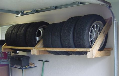 2x4 Tire Rack                                                                                                                                                                                 Mehr Garage Kasten, Arbejdsplads Garage, Officine In Garage, Cabinet Makeover Diy, Smart Garage, Garage Organization Ideas, Tire Storage, Garage Organization Tips, Garage Organisation