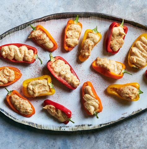 Hummus-Stuffed Peppers Mini Peppers Recipes, Pepper Poppers, Mini Peppers, Pimiento Cheese, Holiday Appetizers Recipes, Healthy Appetizer, Healthy Appetizer Recipes, Stuffed Mini Peppers, Appetizers And Dips