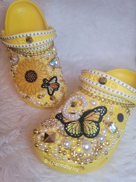 Yellow Bedazzled Crocs, Bedazzled Crocs Shoes, Patches On Shoes, Custom Diy Ideas, Baddie Crocs, Customized Crocs Shoes, Marley Braids Styles, Cute Crocs Shoes, Blinged Crocs