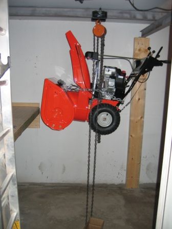 Snowblower Storage In Garage, Snow Blower Storage Ideas, Snow Blower Storage, Snowblower Storage, Lawn Equipment Storage, Blower Storage, Diy Overhead Garage Storage, Garage Shed Ideas, Ariens Snowblower