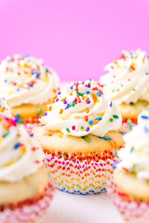 These Birthday Cupcakes are a delicious and fluffy vanilla almond cake that's loaded with sprinkles and topped with an easy and addictive whipped frosting! The Best Vanilla Cake Recipe, Vanilla Almond Cake, Funfetti Cupcake Recipe, Best Vanilla Cupcake Recipe, Ice Cream Rainbow, Chocolate Buttercream Frosting Recipe, Donut Cupcakes, Rainbow Desserts, Funfetti Cupcakes