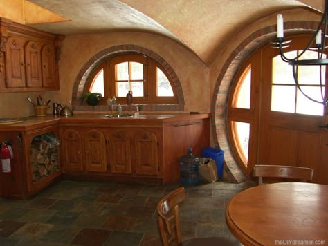 A hobbit kitchen. House Front Ideas, Hobbit Homes, Hobbit Holes, Cob Homes, Circle Door, Hobbit Home, Casa Hobbit, Earth Sheltered Homes, Hobbit Houses