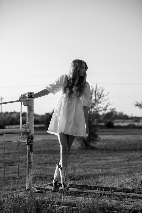 white dress and cowboy boots Wedding Reception Dress With Cowgirl Boots, Dress And Cowboy Boots Photoshoot, Cowgirl Boot Senior Pictures, Country Birthday Pictures, Short Wedding Dress Cowboy Boots, Cowboy Boot Senior Pictures, White Dress And Cowgirl Boots, Cowboy Boots Senior Pictures, White Dress With Cowboy Boots Senior Photos