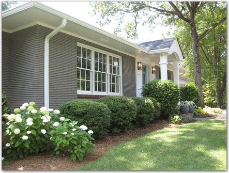 6 ways to update your 1950s ranch with paint, windows, patio and addition. Ranches are affordable archtiecture that are easy to update. Brick Ranch House Exterior, Painted Brick Ranch, Brick Ranch Houses, Painted Brick Exteriors, Ranch House Remodel, Ranch House Exterior, Painted Brick House, Gray House, Ranch Exterior