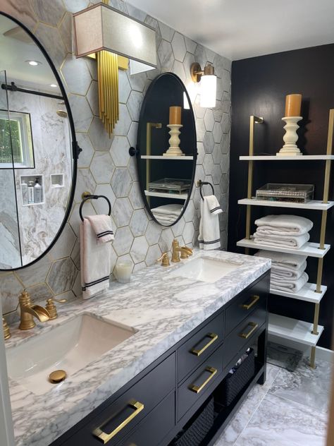 Elegant black, whites and gold. Combination of high-end vanity with simple white and gold shelf from walmart.com. Mirrors from Amazon. Towels from Neiman Marcus. White And Black Bathroom With Gold Accents, Gold White Bathroom Decor, Bathroom Design With Gold Fixtures, Black And Gold Marble Bathroom, Gold White And Grey Bathroom, Gray Gold Bathroom, Black White Grey Gold Bathroom, Gold Themed Bathroom, Black White And Gold Restroom