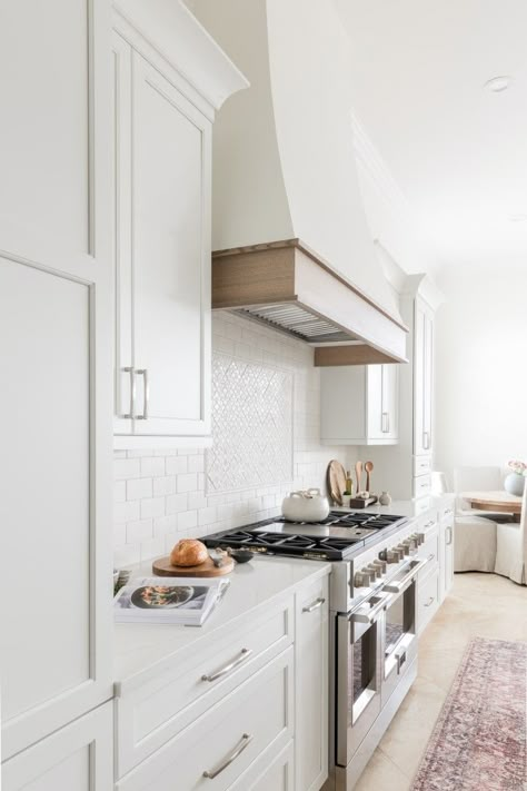 Tall Range Hood, White Range Hood Ideas, Sloped Range Hood Ideas, White Hood With Wood Trim, Off Center Range Hood, Kitchen Hood Styles, Curved Kitchen Hood, Angled Ceiling Kitchen, Hood Ranges Kitchen