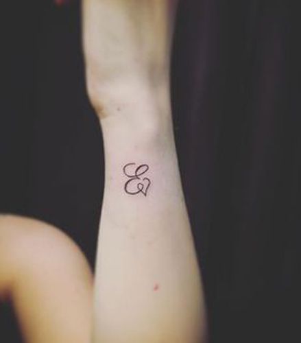 Expressive E Letter Tattoo E Letter Tattoo, Tattoo Ghost, Fonts For Tattoos, Meaningful Wrist Tattoos, E Letter, Letter Tattoo, Monogram Tattoo, Pretty Tattoos For Women, Initial Tattoo