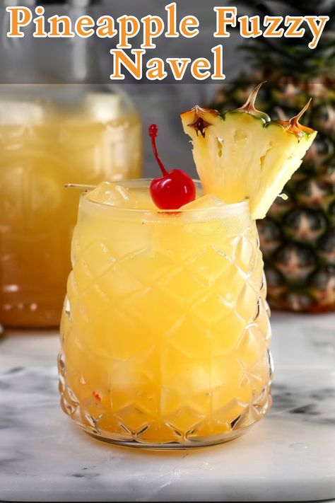 The Pineapple Fuzzy Navel is a refreshing and fruity cocktail that perfectly blends the sweet flavors of peach schnapps, pineapple juice, and orange juice. Fuzzy Navel Drink, Fuzzy Navel, Fruity Cocktail, Fun Drinks Alcohol, Most Popular Cocktails, Pineapple Cocktail, Fruity Cocktails, Peach Schnapps, Cocktail Recipes Easy