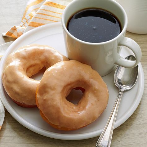 Glazed Doughnuts Recipe -The coffee-flavored glaze on these moist and tasty doughnuts makes them a perfect way to start off the morning...on Christmas Day or any day. You'll find this recipe is a great way to use up leftover potatoes. —Pat Siebenaler, Random Lake, Wisconsin Glazed Doughnuts Recipe, Doughnuts Recipe, Glazed Doughnuts, Taste Of Home Recipes, Doughnut Recipe, Glaze Recipe, Sweet Roll, Sweet Rolls, Coffee Cakes