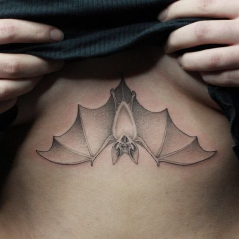 Bat Tattoo Ribs, Bat Tattoo Underbust, Bat Tattoo Under Breast, Cartoon Bat Tattoo, Bat Hanging Upside Down Tattoo, Gothic Bat Tattoo Designs, Bat Shoulder Tattoo, Bat Tattoo Sternum, Sternum Bat Tattoo