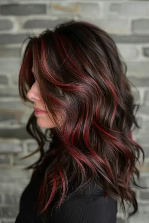 35+ Gorgeous Ways To Wear Red Highlights in Brown Hair - Flo's Blog Dark Hair With Reddish Highlights, Low Light Red Hair, Brown Hair With Red Peak A Boo, Light Brown Hair With Burgundy Lowlights, Red Hairlights In Brown Hair, Light Red Highlights On Dark Hair, Red Purple Hair Highlights, Dark Brunette With Red Highlights, Red Wine Highlights On Black Hair