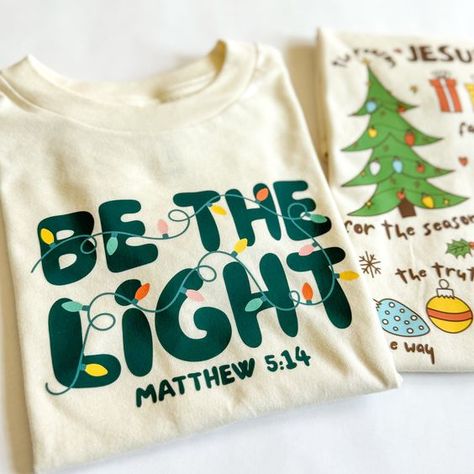 Be the Light - Kids Christmas Unisex Shirt - Black / 5T Christmas t shirt #christmastshirt T shirt #tshirt t-shirt #t_shirt t shirts #tshirts t-shirts #t_shirts T shirt design #tshirtdesign T-shirt designs #t_shirtdesign T shirts designs #tshirtsdesigns 1.13 Cricut Throw Pillows, School Christmas Shirt, The Joy Of Christmas Is Family, Christian School Shirt Designs, Popular Christmas Shirts, Christmas Shirts Boys, Sublimation Shirts Christmas, Cute Christmas T Shirts, Christmas Christian Tshirts