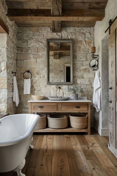 Use these tips to refresh your bathroom floor and give it a bit of style. Patina Farm Bathroom, Farmhouse Bathroom Brick Floor, Rustic Herringbone Floor, Rustic Tiles Bathroom, Tumbled Travertine Bathroom, River Stone Bathroom, Stone Wood Bathroom, Rustic Double Vanity Bathroom, Rustic Tile Bathroom