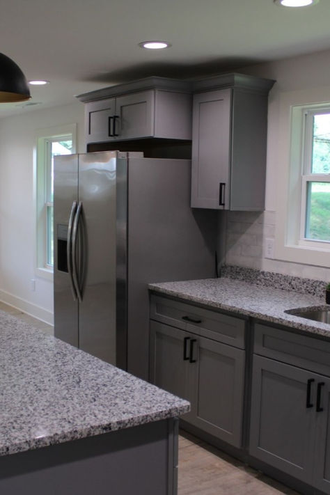 This modernized kitchen features various ranges of gray, accented by black fixtures and stainless steel appliances to give it a modern gray scale look.
-
-
-
-
-
-
#gray #kitchen #modern #black Grey Cabinets With Black Appliances, Kitchen Grey Cabinets Black Counter, Black And Gray Kitchen Cabinets, Modern Grey Kitchen Cabinets, Modernized Kitchen, Kitchen Modern Black, Grey And Black Kitchen, Grey Cabinets Kitchen, Contemporary Grey Kitchen