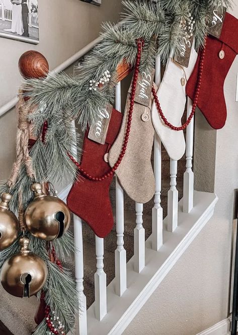 No Fireplace? No problem. Try These 20 Creative Christmas Stocking Hanging Ideas — ASHLINA KAPOSTA Stockings On The Stairs, Stockings Hung On Stairs, Christmas Stocking Tree, Christmas Stockings No Fireplace, Christmas Decor Ideas For Staircase, Christmas Stocking Hanging Ideas, Stockings On Staircase, Stocking Hanging Ideas, Hanging Christmas Cards