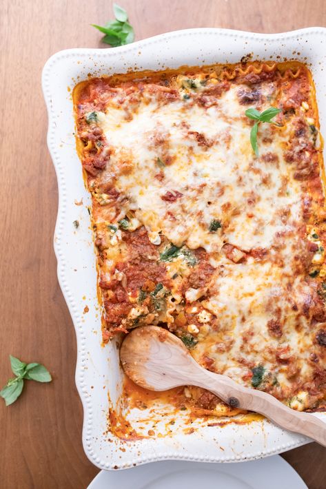 You need this healthy lasagna recipe - friends and strangers have called it "the BEST lasagna recipe EVER"! I’ve been improving this recipe for over 15 years. It’s a much healthier lasagna recipe now! You might know, I’m a former Registered Dietitian, so it’s in my job description to pump everything I can with nutrients. But, I’m also a real person who won’t sacrifice taste for nutrition. This recipe is a nice balance of the two. Healthy Homemade Lasagna, Best Healthy Lasagna Recipe, Health Lasagna Recipe, Healthy High Protein Lasagna, Bison Lasagna Recipe, High Protein Lasagna Recipe, Lentil Pasta Bake, Healthy Lasagna Recipes Clean Eating, Healthier Lasagna Recipe