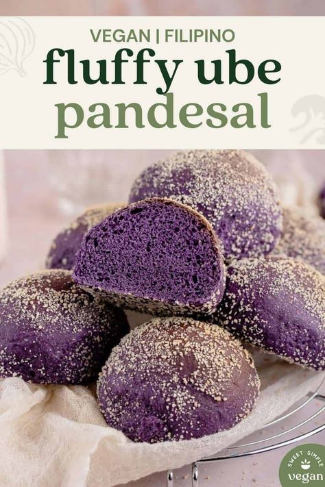 A Filipino breakfast staple made vegan! This ube pandesal recipe is soft, fluffy, and delicious. Pandesal is great any time of day and can be enjoyed on its own or with sweet or savory fillings. #pandesal #ubepandesal #ubecheesepandesal #veganpandesal #veganfilipino #filipino #sweetsimplevegan #sweetbread #ube Ube Pandesal Recipe, Yam Bread, Ube Dessert, Purple Foods, Pandesal Recipe, Filipino Bread, Vegan Breads, Filipino Breakfast, Ube Recipes