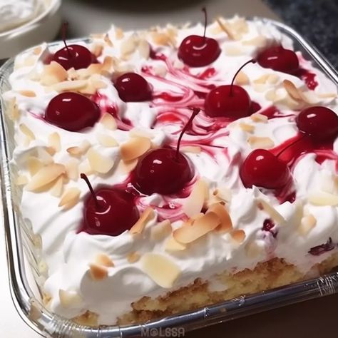 This heavenly cake is a sweet tooth's dream come true. With fluffy angel food cake, tart cherry pie filling, smooth vanilla pudding, creamy whipped topping, and optional crunch from sliced almonds, every bite transports you Cherry Cake With Cherry Pie Filling, Deserts Recipes With Angel Food Cake, Cherry Whipped Cream Dessert, Cherry Cheesecake Cake, Things To Do With Angel Food Cake, Cakes With Cool Whip, Cherry Angel Food Cake Dessert, Desserts Using Angel Food Cake, Sweet Ideas Desserts