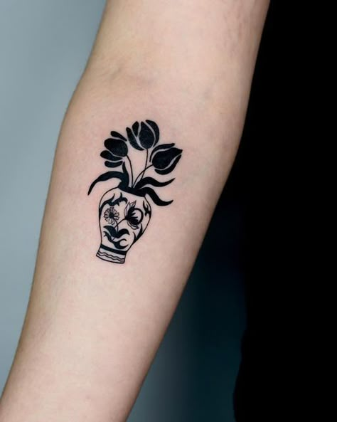 Vase With Tulips Tattoo, Give And Take Tattoo, Vase Of Tulips Tattoo, Italian Vase Tattoo, Tulip Tattoo Traditional, Skull Vase Tattoo, Tulip Vase Tattoo, Tulip Stamp Tattoo, Small Black Tattoo Ideas