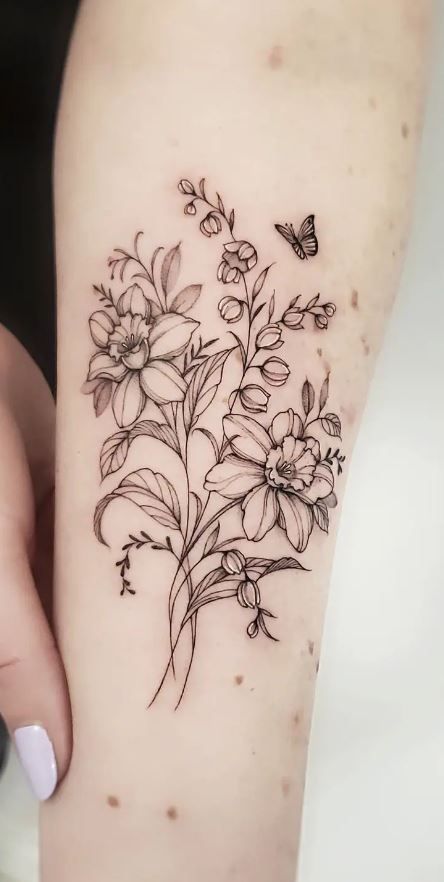 << Check out more Daffodil Tattoos, Ideas and Meanings #tattoomenow #tattooideas #tattoodesigns #tattoos #daffodil #flower #floral #birthflower Narcissus Tattoo, Daffodil Flower Tattoos, Narcissus Flower Tattoos, Aster Flower Tattoos, Daffodil Tattoo, Bouquet Tattoo, Floral Tattoo Sleeve, Birth Flower Tattoos, Forearm Tattoo Women