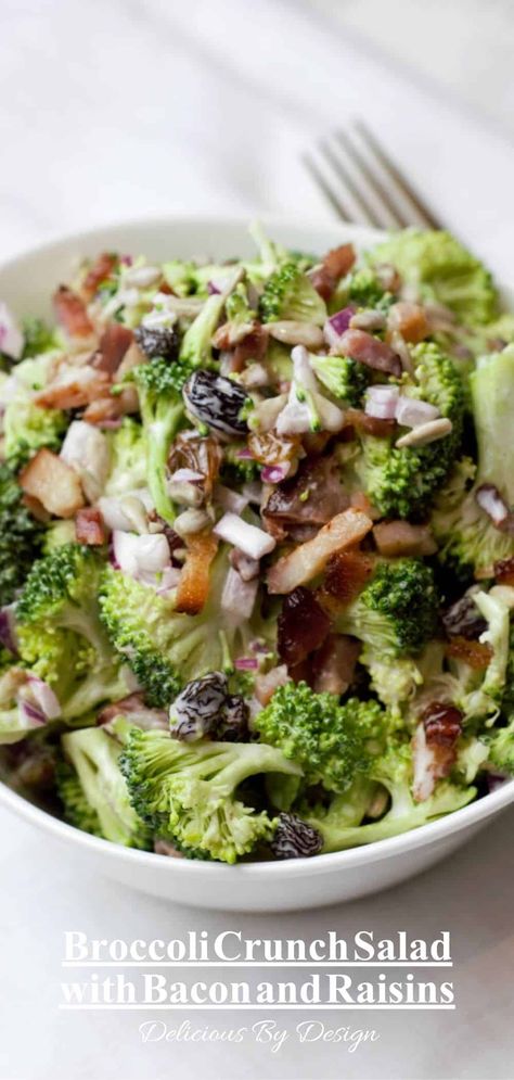 Enjoy the crunch of this raw broccoli salad punched up with bacon, onion, raisins, sesame seeds, and a tangy three ingredient dressing. Broccoli Crunch Salad, Raw Broccoli Salad, Crunchy Broccoli Salad, Broccoli Salad With Raisins, Raisin Salad, Crunchy Broccoli, Broccoli Bacon, Broccoli Crowns, Crunch Salad