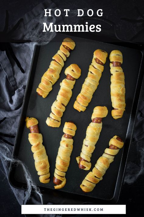 Kids can make these adorable mummy dogs themselves. Made with your favorite hot dogs and crescent rolls, these are a great meal to serve before Trick-or-Treating! Hot Dog Mummies Crescent Rolls, Mummy Hotdogs Crescent Rolls, Crescent Wrapped Hot Dogs, Mummy Hot Dogs Crescent Rolls, Crescent Roll Hot Dogs, Halloween Mummy Hot Dogs, Mummy Hot Dogs Recipe, Healthy Sandwich Ideas, Hot Dog Crescent Rolls