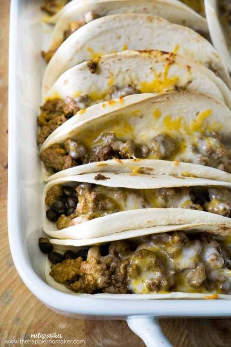 These easy oven baked soft tacos are a delicious and easy way to feed a crowd! Way less messy, especially for the kids! Baked Soft Tacos Ground Beef, Baked Soft Tacos, Ground Turkey Taco Recipes, Easy Tortilla Recipe, Soft Tacos Recipes, Turkey Tacos Recipes, Oven Baked Tacos, Baked Tacos, Chicken Soft Tacos