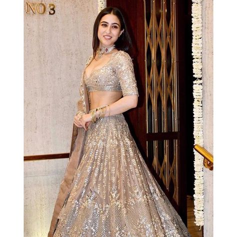 Sara Ali Khan on Instagram: "Diwali nights 🎊🎊🎊 It’s the festival of lights 🪔🪔🪔 Forget all the pettiness and fights 💝💝 Just enjoy mithai and sweet bites 🍡🍡🍡 @manishmalhotra05 @yogenshah_s" Heavy Lehenga, Gold Organza, Telugu Heroines, Simple Lehenga, Trendy Outfits Indian, Wedding Lehenga Designs, Lehenga Designs Simple, Sweet Bites, Indian Bride Outfits