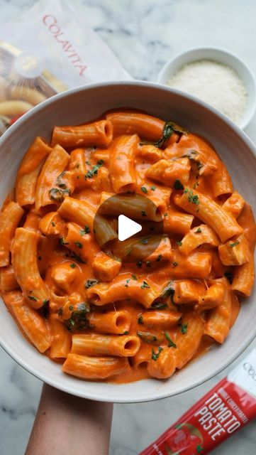 The Pasta Table • Jessica on Instagram: "Roman Rigatoni Fiorentina featuring @colavitausa 🍝 I’m obsessed with the shape of their rigatoni. This is also one of my all-time favorite recipes. It’s a spiced-up rigatoni alla vodka with chicken, spinach, and melted mozzarella cheese - YUM! Pick up these Colavita products at your local grocery store or on their online store, and make this recipe!

 
Ingredients: 
- 1/2 lb. Colavita Roman Rigatoni 
- 1/2 lb. chicken breast tenders, cubed 
- 4 tbsp. Colavita extra virgin olive oil 
- 1/2 shallot, finely chopped 
- 4 garlic cloves, minced 
- 6 oz. Colavita tomato paste 
- 1/2 tsp. salt 
- 1/4 cup vodka 
- 1 cup heavy cream 
- 3 oz. fresh baby spinach 
- 1/2 cup whole milk mozzarella, shredded 
- 1 tbsp. Italian parsley, finely chopped 
- Salt and p Rigatoni Fiorentina, Pasta Table, Chicken Breast Tenders, Italian Parsley, Alla Vodka, Chicken Spinach, Tender Chicken Breast, Local Grocery Store, Rigatoni