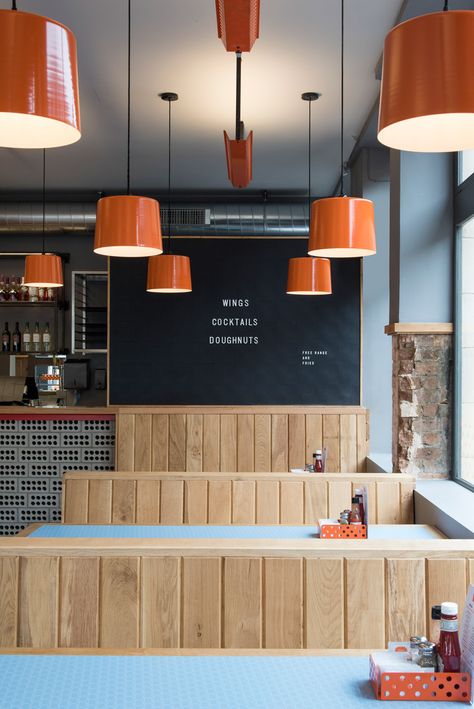 Bird Islington by Brinkworth Restaurant Seating Design, Cafe Industrial, Fried Chicken Restaurant, Chicken Restaurant, Bar Restaurant Design, Chicken Shop, Industrial Restaurant, Restaurant Seating, Door Design Modern