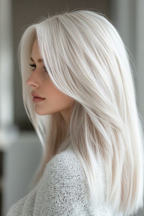 23 Gorgeous Winter Hair Color Ideas For Blondes Medium Ice Blonde Hair, Icy Silver Hair Ice Blonde, Ice Blonde Hair Color Ideas, Ice White Blonde Hair, Winter Blonde Hair Trends 2024, Best Blonde For Red Skin Tone, Platinum Cool Blonde Hair, Icy Vanilla Blonde Hair, Long Ice Blonde Hair