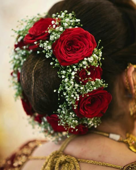 What a beautiful large low bun with real flower gajra! Care however should be taken before adopting such hairstyles, as due to it's high static charge, it will cause phlegm to move up in the throat, causing the voice to quaver & a frequent urge to clear the throat. A heavy chabi chhalla with a long & wide hook if inserted at the edge of the pleats of the saree, will reduce this problem as it's hook will activate the acupressure points that act to keep the throat clear. Bridal Hair Decorations, Bridal Hairstyle Indian, Hairstyle Indian Wedding, Hairstyle Indian, Bridal Hairstyle Indian Wedding, Flower Bun, Wedding Bun, Wedding Flower Jewelry, Intricate Braids