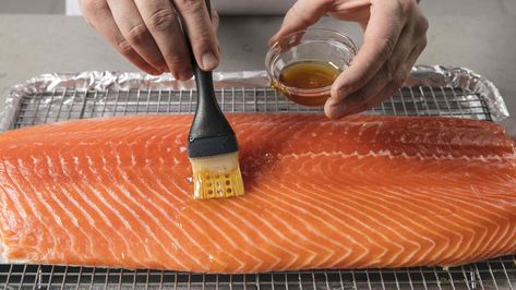 Roasted Salmon for a Crowd | Cook's Illustrated Salmon For A Crowd, Side Of Salmon, Seafood Dinner Party, Almond Pesto, Raw Salmon, New York Bagel, Arugula Pesto, Wouldn't It Be Nice, America's Test Kitchen Recipes