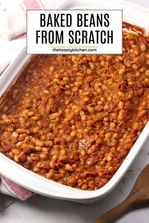 Baked beans from scratch by The Toasty Kitchen. Make baked beans from scratch for your next holiday dinner or family barbecue! Navy beans are simmered in a rich, sticky sauce made with molasses, brown sugar, and bacon. #bakedbeans #sidedish #bbq Baked Beans With Great Northern Beans, Barbeque Baked Beans, Baked Beans On Stovetop, Baked Beans Recipe Crockpot From Scratch, Thanksgiving Baked Beans, Baked Beans With Pork And Beans, Texas Baked Beans, Sweet Baked Beans Recipe, Homemade Baked Beans From Canned Beans