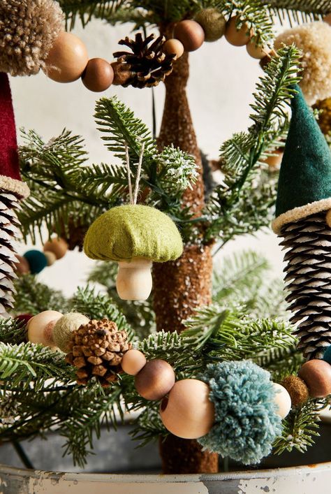 Turn your home into an enchanted winter wonderland with this nature-inspired trend. #mushroomdecor #mushroomchristmasdecor #holidaydecor #bhg Christmas Forest Decor, Mushroom Christmas Decor, Christmas Forest Wonderland, Forest Christmas Decor, Forest Green Christmas, Woodland Christmas Theme, Christmas Aesthetic Ideas, Christmas In The Woods, Christmas Decor Room